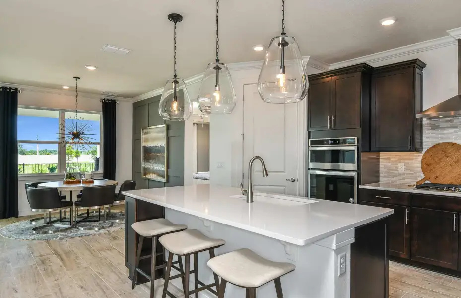 Representative furnished interior of a home built from the Coral by Pulte Homes in Hilliard Isle, Kissimmee (Image 7).