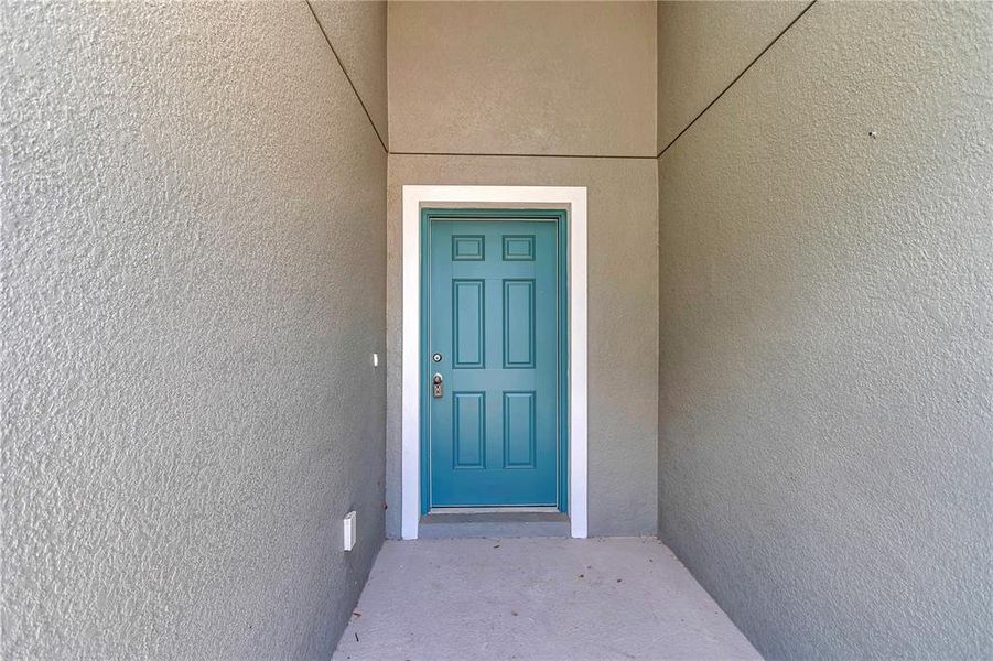 Exterior details and patio area of a home in Diamond Ridge, Belleview (Image 3).
