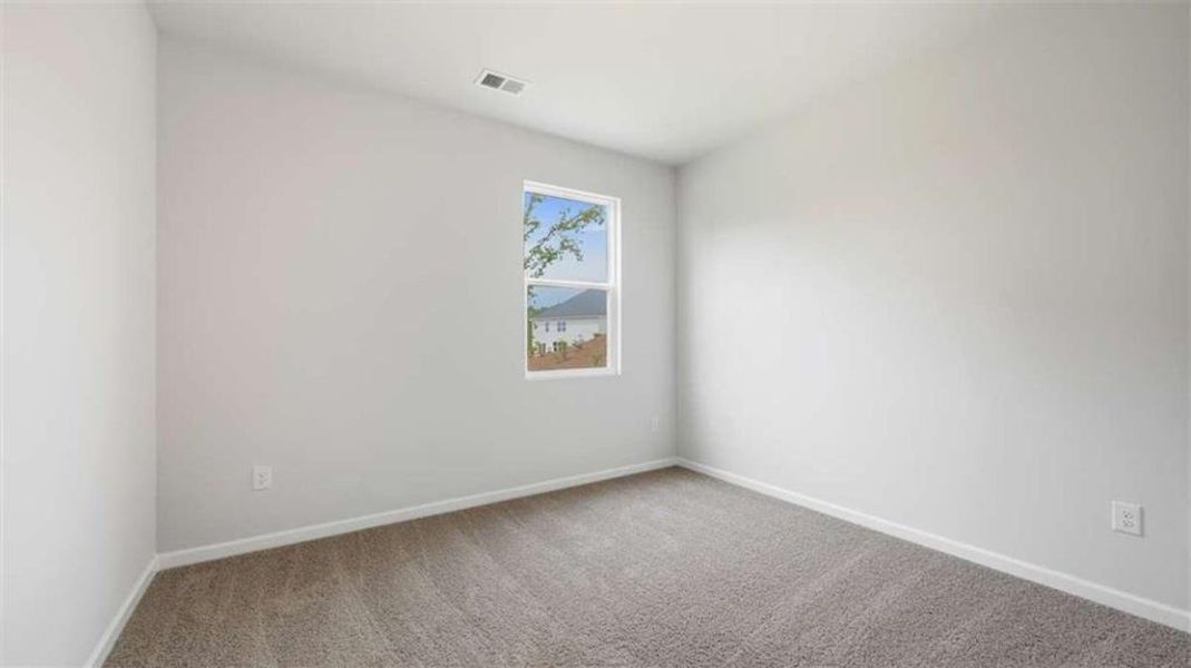 Spacious, unfurnished interior of a new home in Brooks Station, Dacula (Image 23).