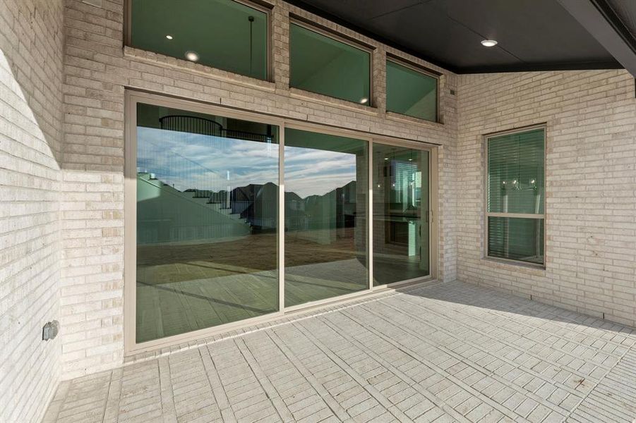 Exterior details and patio area of a home in Cambridge Estates - Harwood, Prosper (Image 22).