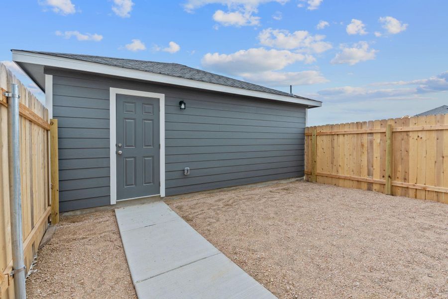 Exterior details and patio area of a home in Retreat at Hero Way, Leander (Image 4).