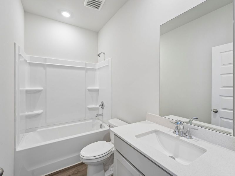 Furnished interior view inside a new home in Hemingway - Highland Series, Cumming (Image 14).
