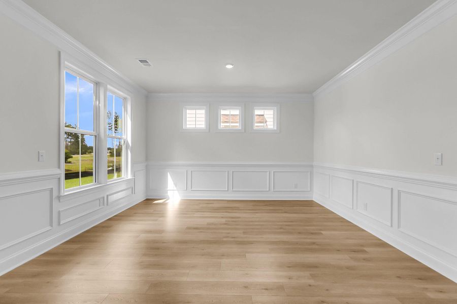 Spacious, unfurnished interior of a new home in Tidewater at Lakes of Cane Bay, Summerville (Image 30).