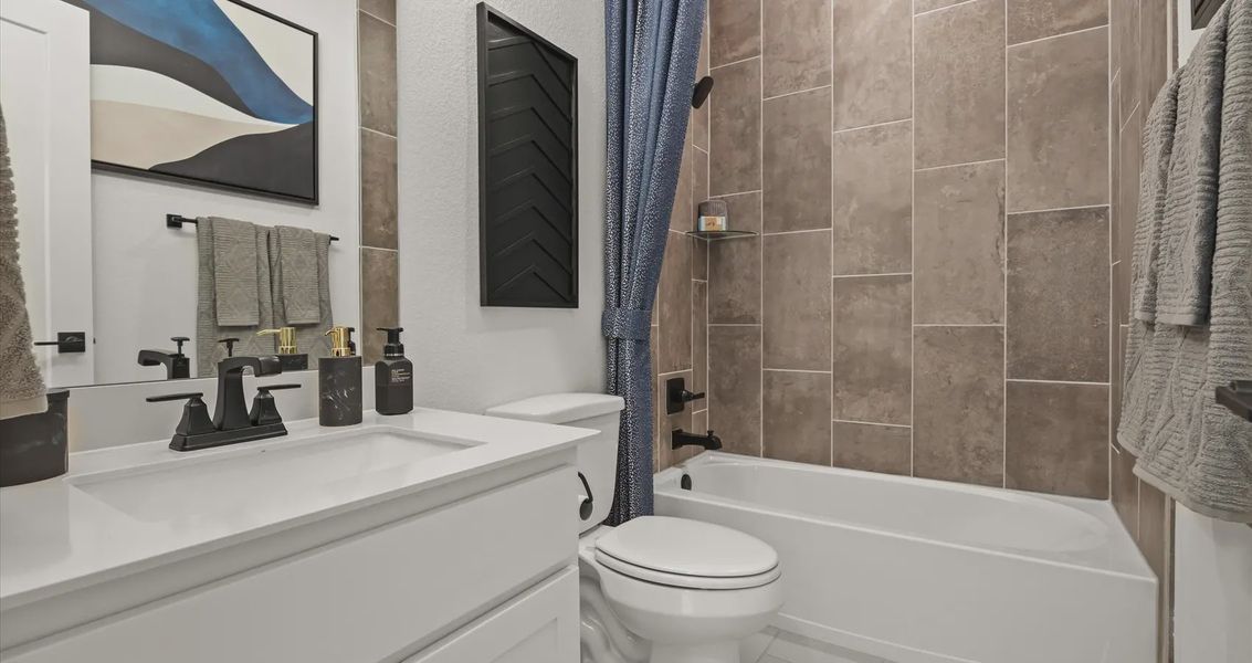 Representative furnished interior of a home built from the Orion by Chesmar Homes in Sunfield, Seguin (Image 17).