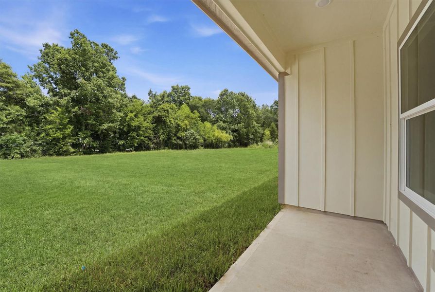 Exterior details and patio area of a home in , Conroe (Image 3).