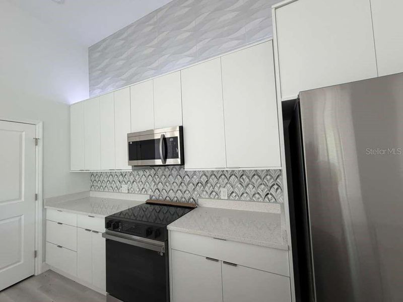 Furnished interior view inside a new home in , North Port (Image 6).