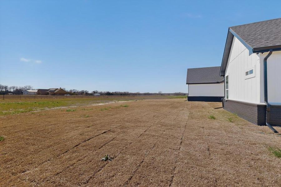 View of yard featuring a view of countryside