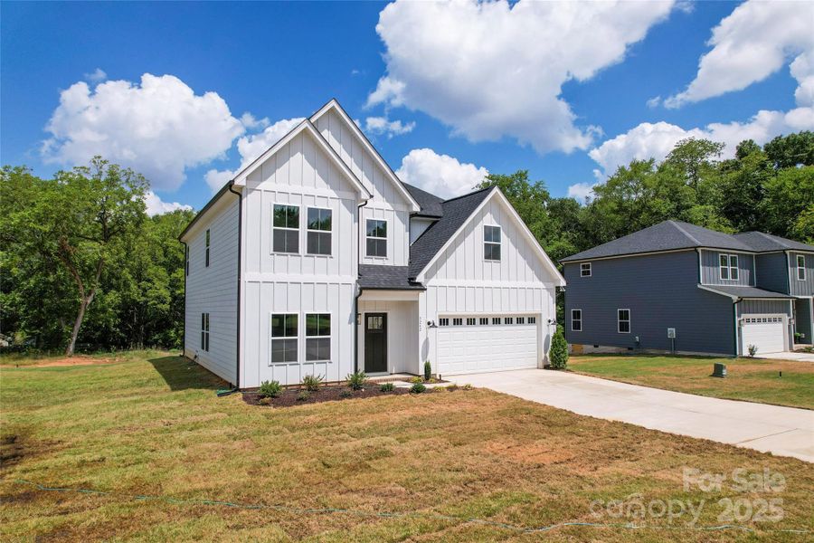 Front exterior of a new home in , Harrisburg, NC, highlighting curb appeal (Image 18).