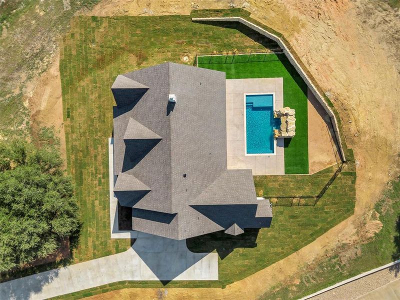 Front exterior of a new home in , Granbury, TX, highlighting curb appeal (Image 1). Front exterior of a new home in , Granbury, TX, highlighting curb appeal (Image 1).