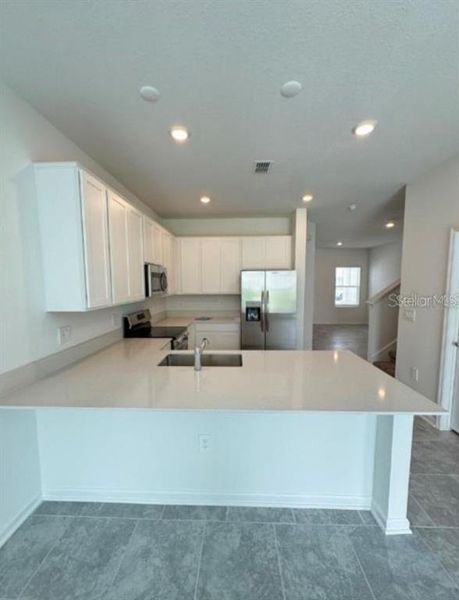 Furnished interior view inside a new home in , Davenport (Image 2).