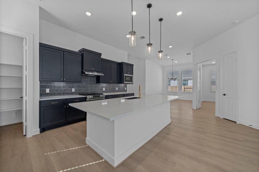 Furnished interior view inside a new home in Artavia, Conroe (Image 9).