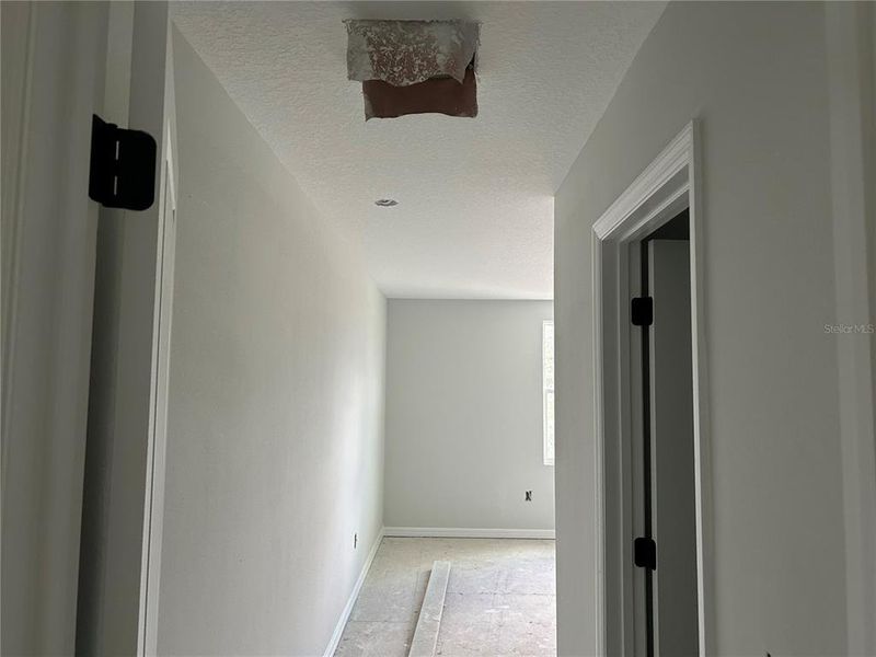 In-progress construction of a new home in Oakfield Trails Signature, Parrish, FL (Image 34).