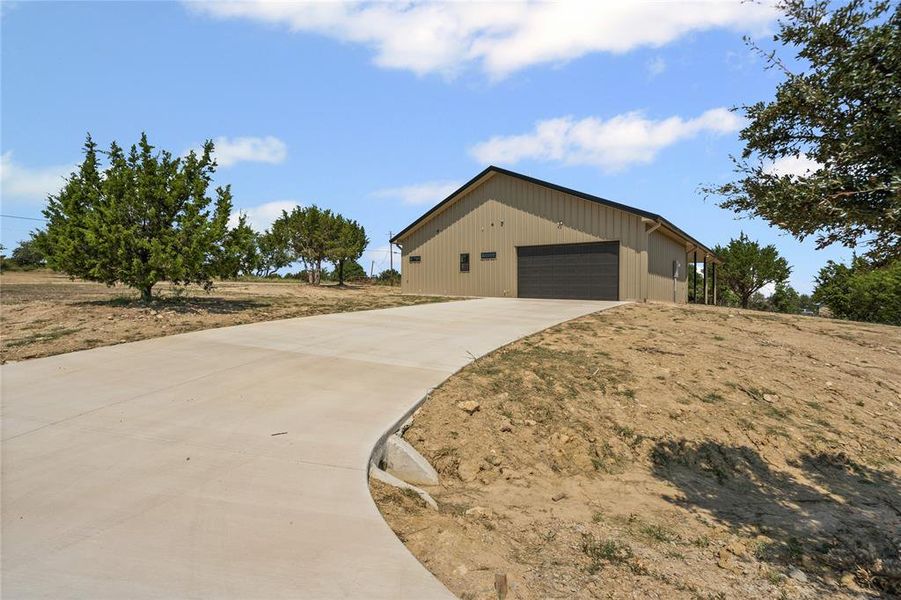 Front exterior of a new home in , Springtown, TX, highlighting curb appeal (Image 23). Front exterior of a new home in , Springtown, TX, highlighting curb appeal (Image 23).