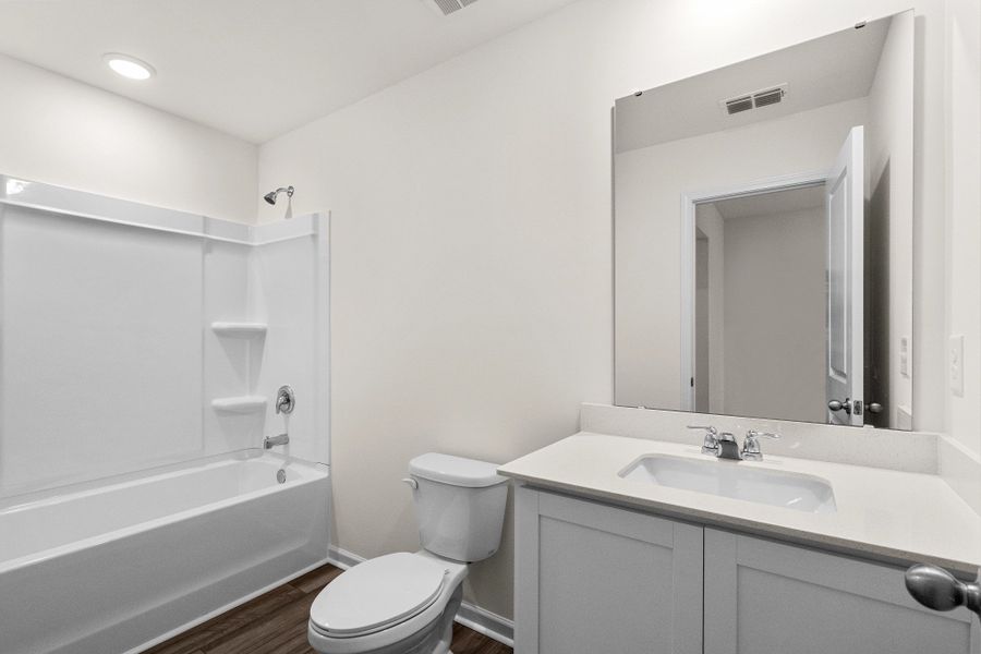 Representative furnished interior of a home built from the Highland by Starlight Homes in Sutton Farms, San Antonio (Image 11).