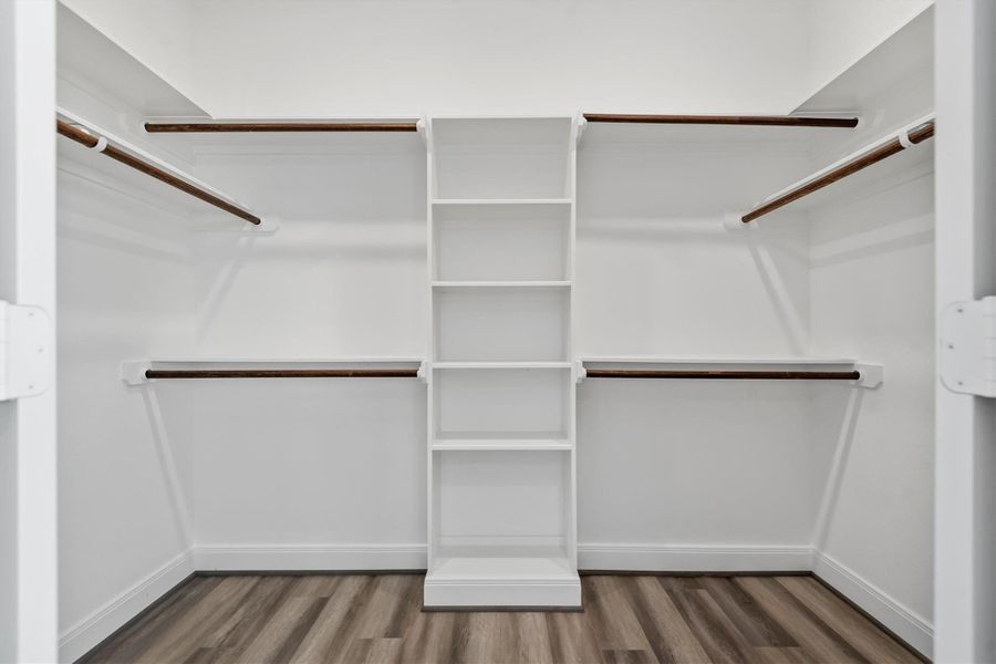 Primary with walk-in closet and built-in.