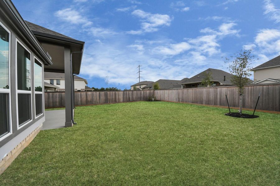 Exterior details and patio area of a home in Bridgeland: Heritage Collection, Cypress (Image 24).