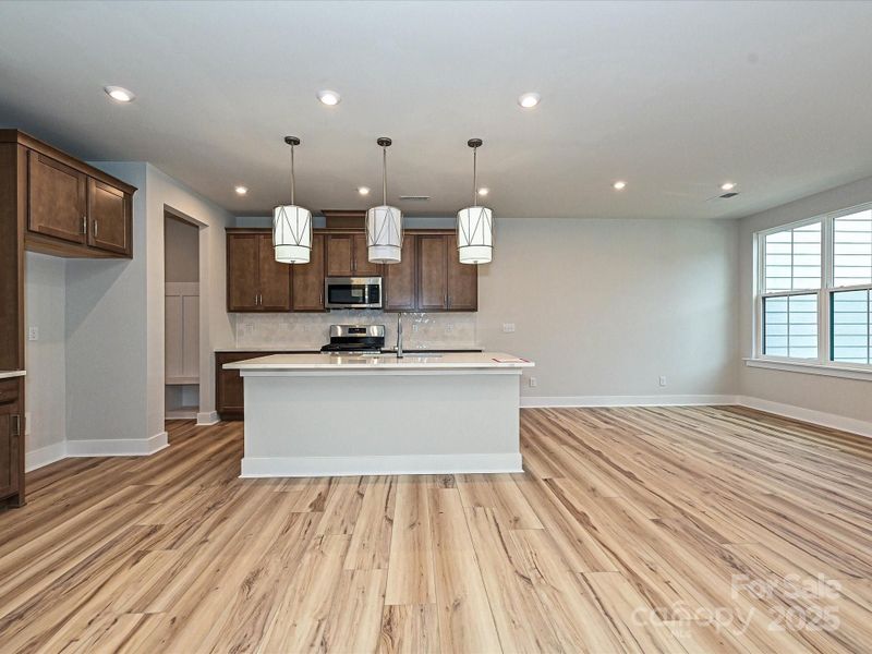 Central kitchen because the heart of the home should be the main event.