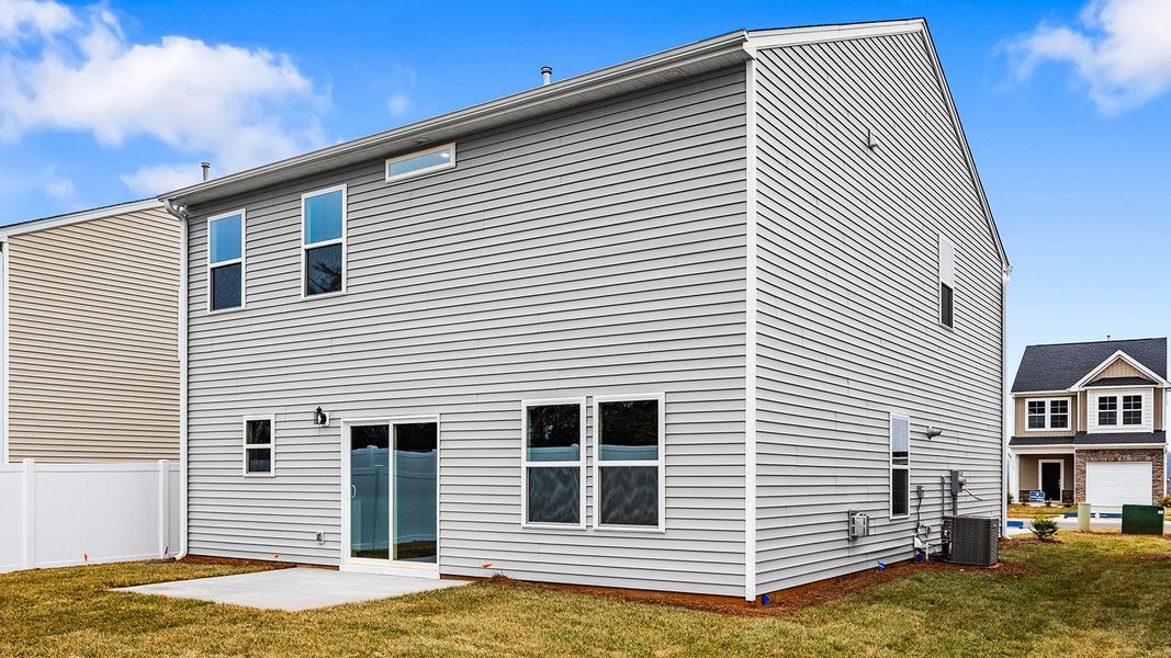 Exterior details and patio area of a home in Hanes Lake, Winston-Salem (Image 3).