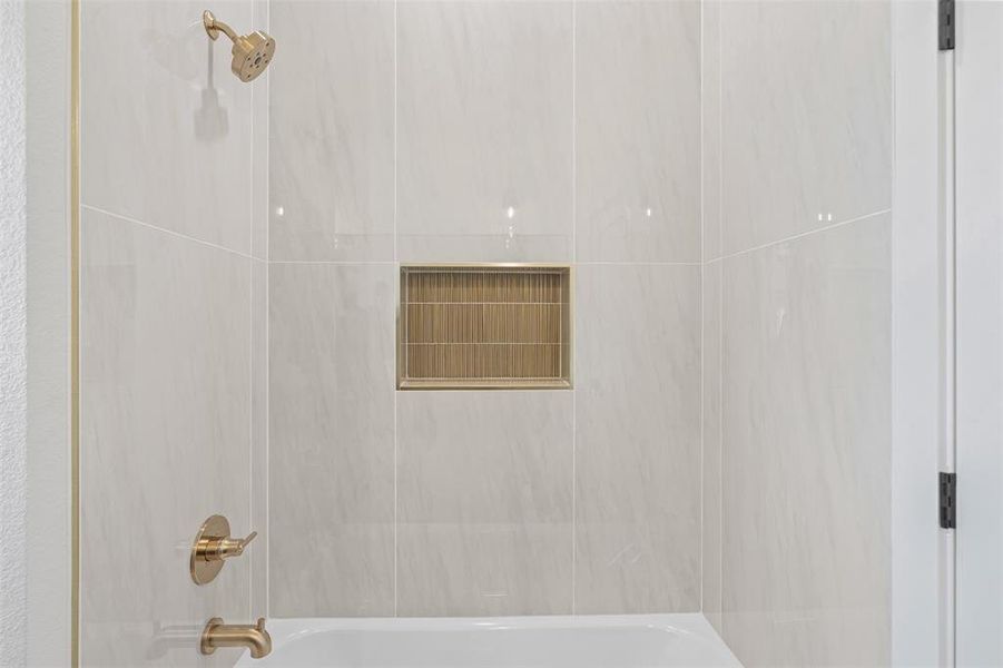 Bathroom featuring shower / bath combination