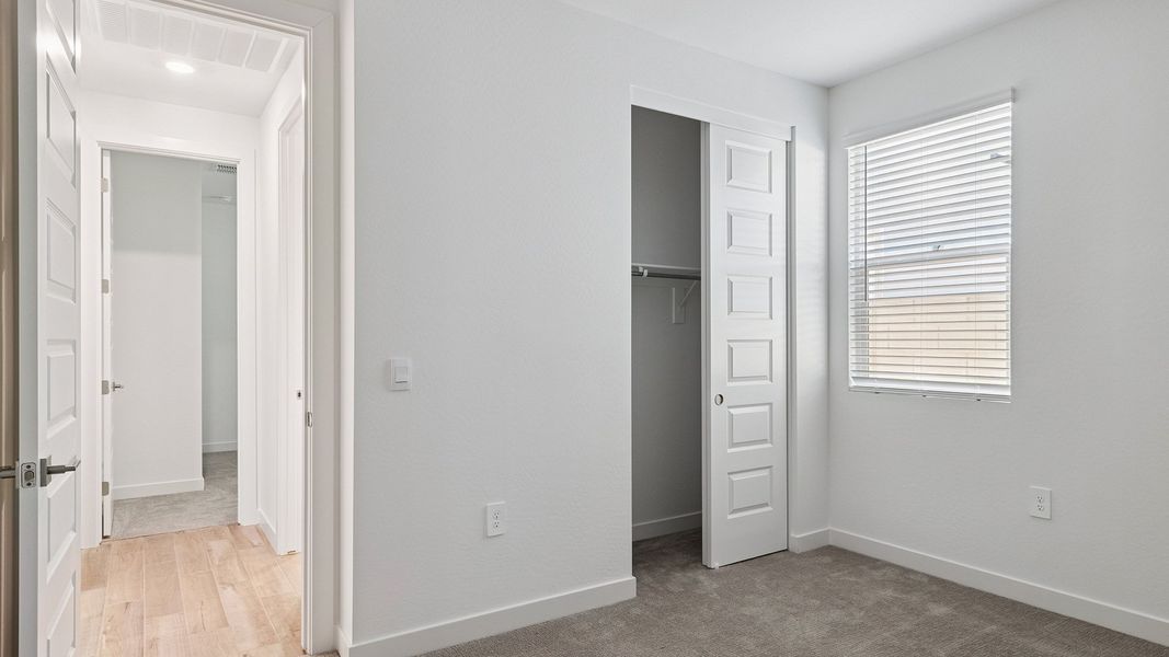 Representative unfurnished interior of a home built from the Hayden by D.R. Horton in The Ridge at Stone Butte, Phoenix (Image 27).