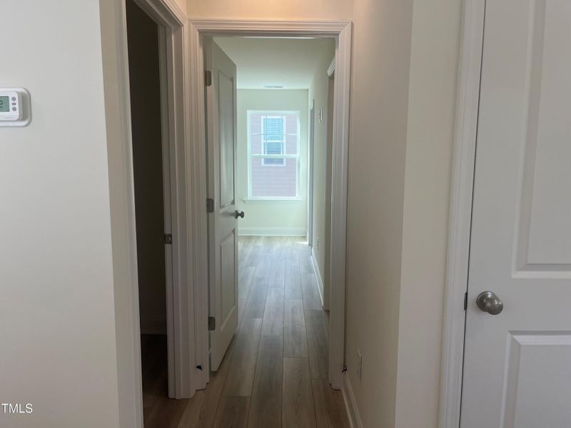 Hallway leading into secondary bedrooms