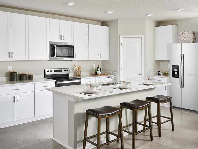 Furnished interior view inside a new home in Villamar - Signature Series, Winter Haven (Image 3).