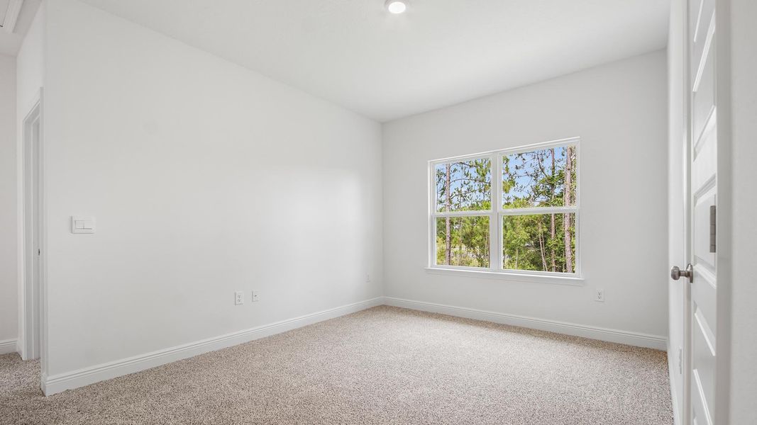 Representative unfurnished interior of a home built from the Carol by D.R. Horton in Holley Grove at Peach Creek, Santa Rosa Beach (Image 20).