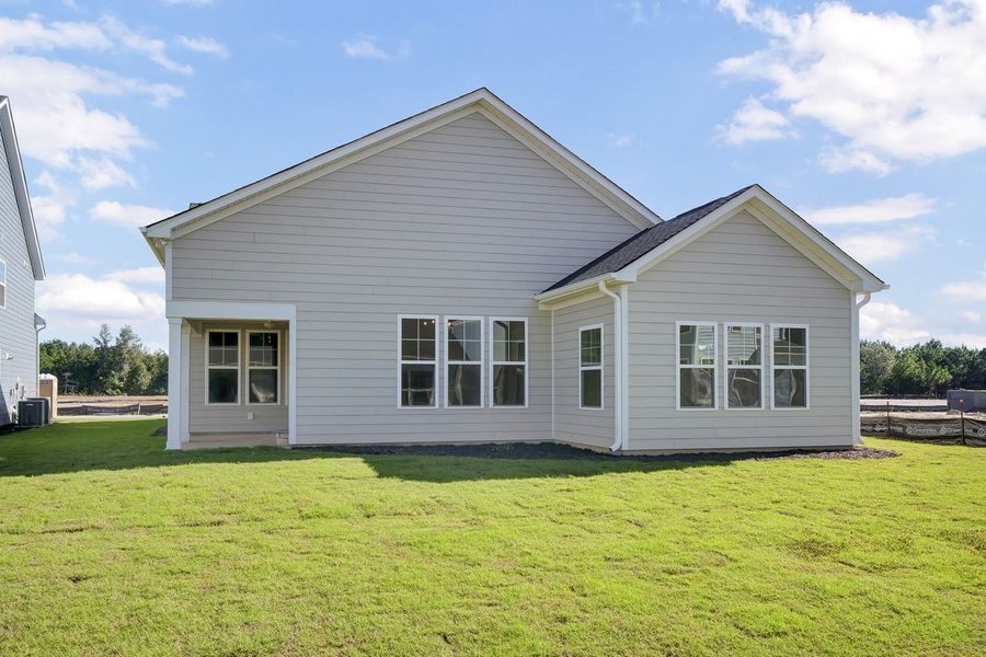 Exterior details and patio area of a home in Grand Park, Leland (Image 3).