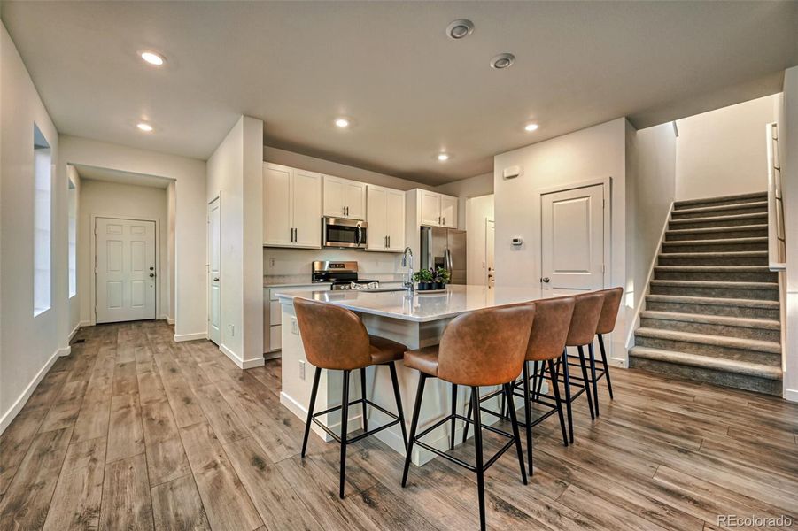 Kitchen view to the front door from the living room Kitchen view to the front door from the living room