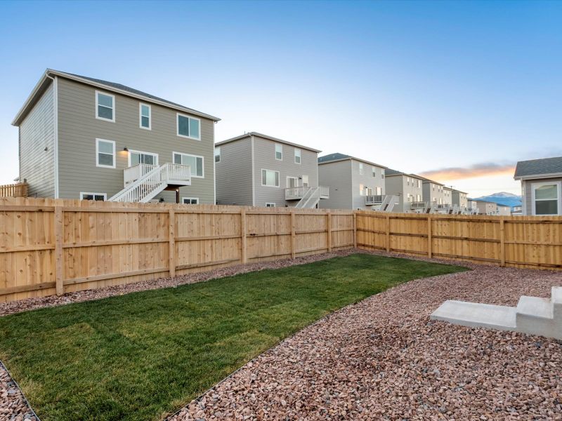 Exterior details and patio area of a home in Lorson Ranch: The Trail Collection, Colorado Springs (Image 3).
