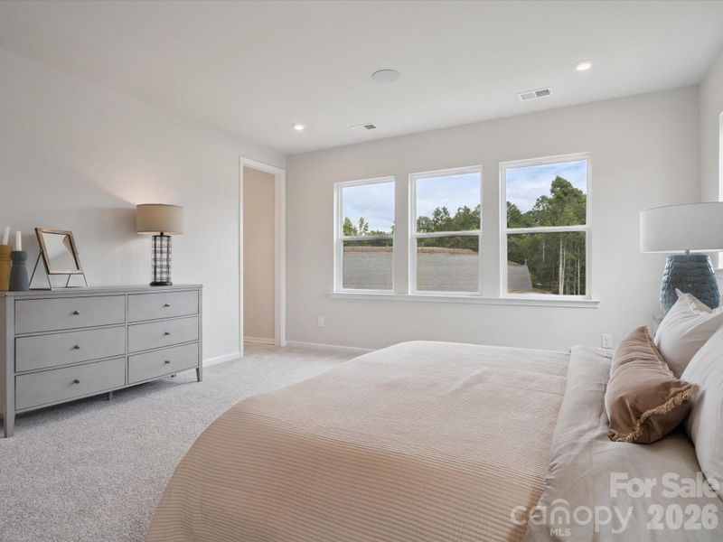 Light filled primary bedroom