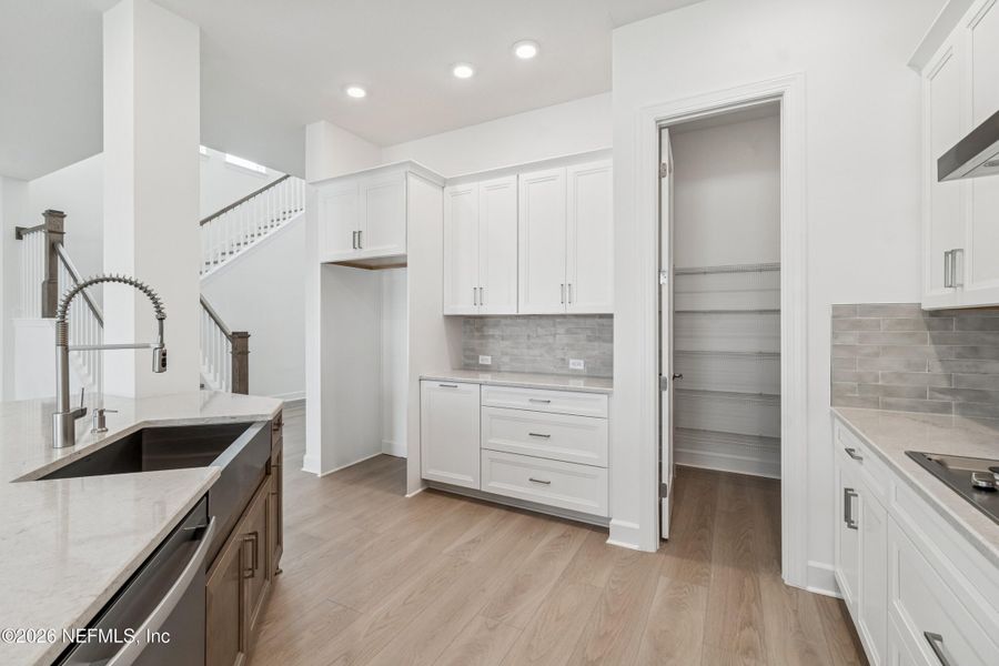 Furnished interior view inside a new home in Evergreen Island at Silverleaf - Executive, St. Augustine (Image 9).