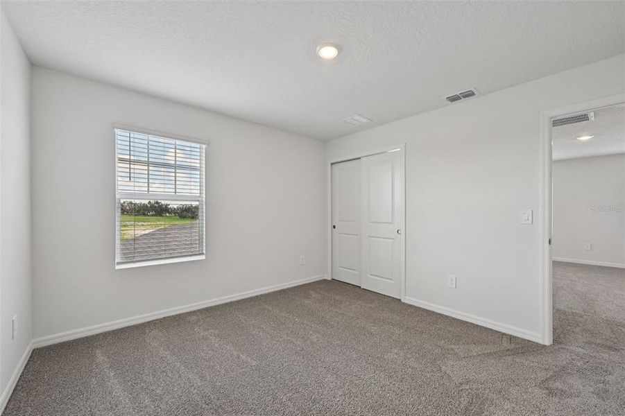 Spacious, unfurnished interior of a new home in Salt Meadows - Premier Series, Parrish (Image 26).