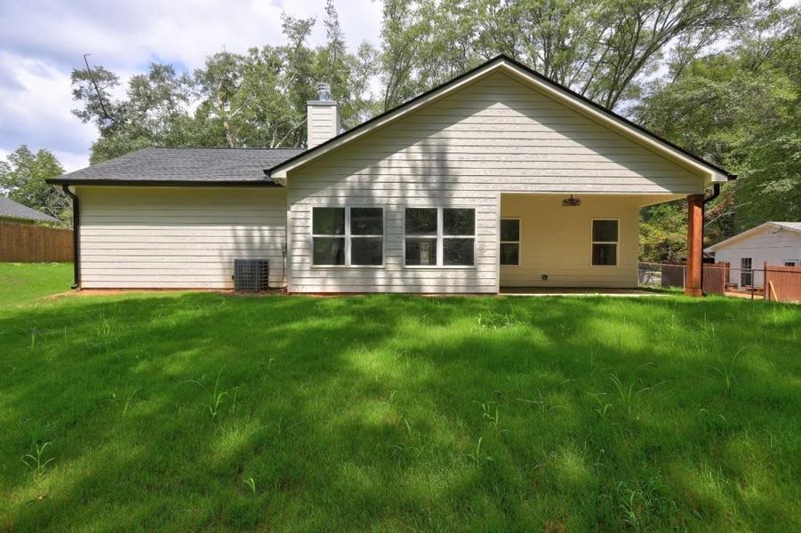 Front exterior of a new home in , Monroe, GA, highlighting curb appeal (Image 22).