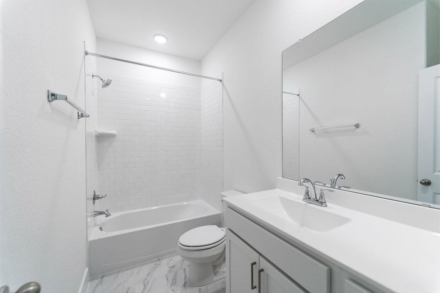 Furnished interior view inside a new home in Sunterra, Katy (Image 5).