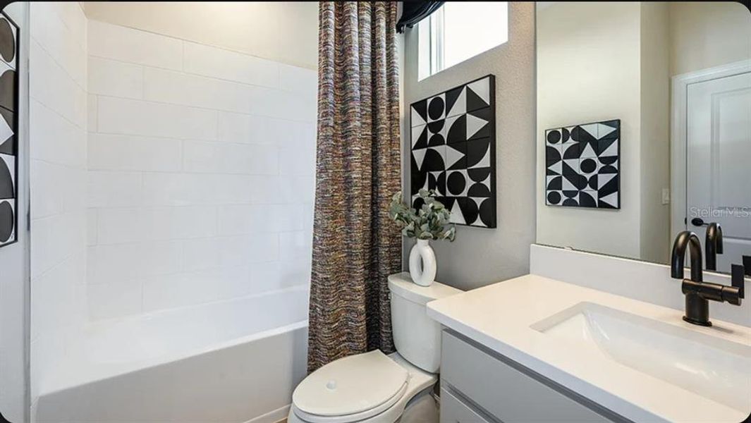 Furnished interior view inside a new home in Esplanade at Wellen Park, Englewood (Image 8). Furnished interior view inside a new home in Esplanade at Wellen Park, Englewood (Image 8).