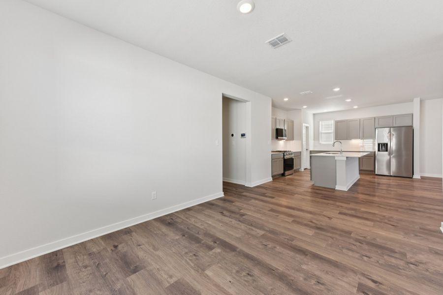 A large empty kitchen. A large empty kitchen.