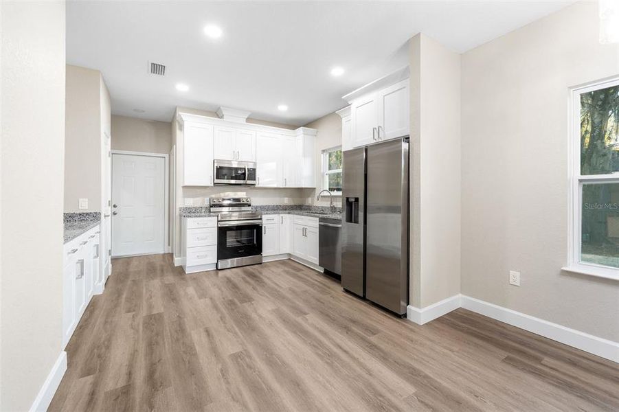 Furnished interior view inside a new home in , Gainesville (Image 5).