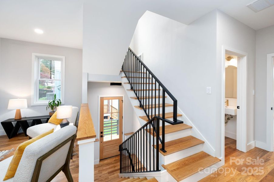 Inviting Entry and Custom Handrails By Perdue Studios