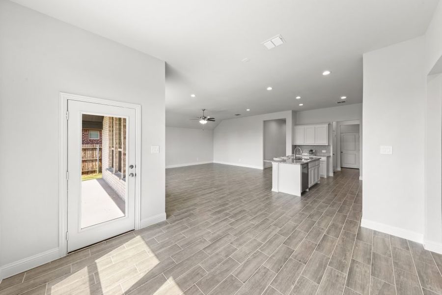 Representative exterior photo of a completed home built from the Hampton by Impression Homes in Timberbrook, Justin, TX (Image 11). Representative exterior photo of a completed home built from the Hampton by Impression Homes in Timberbrook, Justin, TX (Image 11).