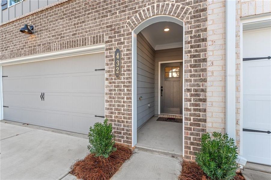 Exterior details and patio area of a home in River Walk Place, Lawrenceville (Image 3).