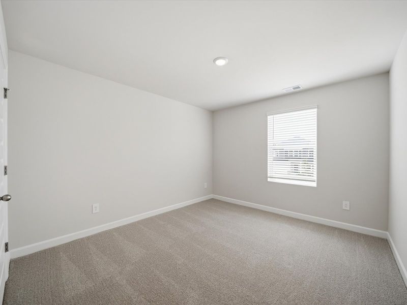 Spacious, unfurnished interior of a new home in The Farm at Wells Creek - Signature Collection, Gray Court (Image 19).