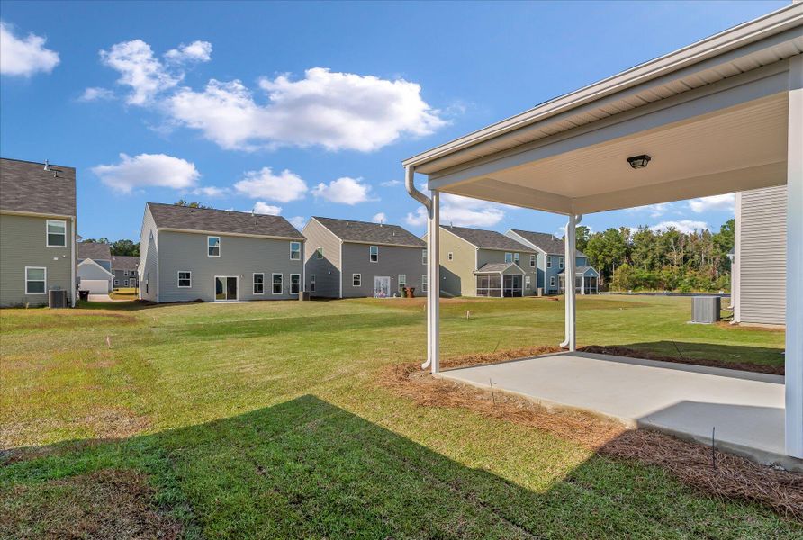 Exterior details and patio area of a home in Oakley Pointe, Moncks Corner (Image 23).