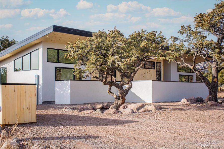 Front exterior of a new home in , Crestone, CO, highlighting curb appeal (Image 21).