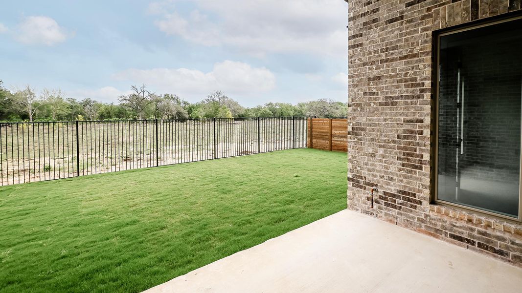 Exterior details and patio area of a home in Juniper Springs, Lockhart (Image 4).