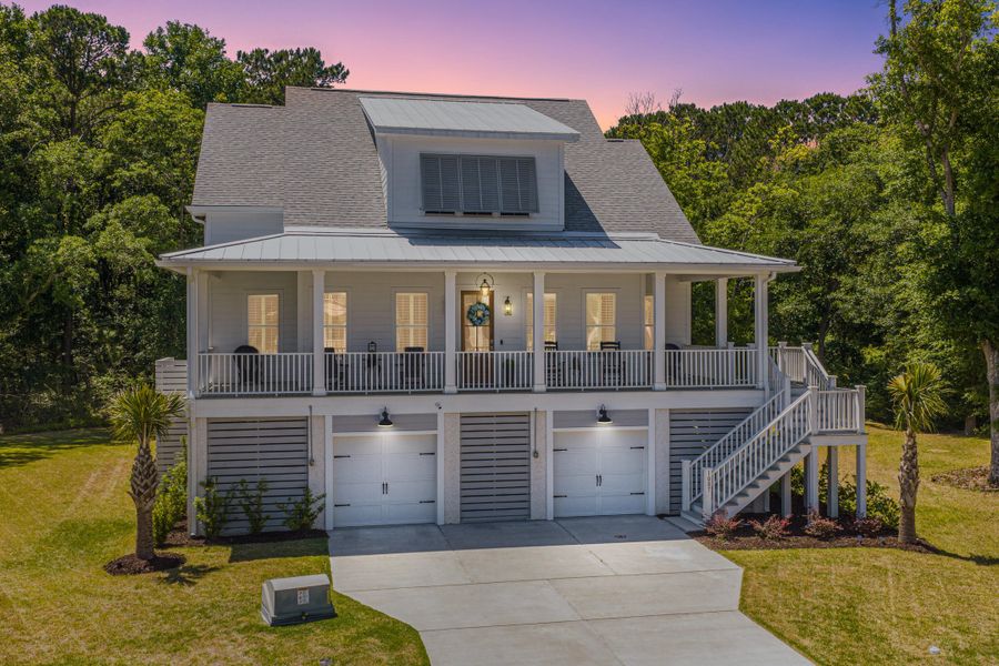 Front exterior of a new home in Overlook at Copahee Sound, Awendaw, SC, highlighting curb appeal (Image 24).