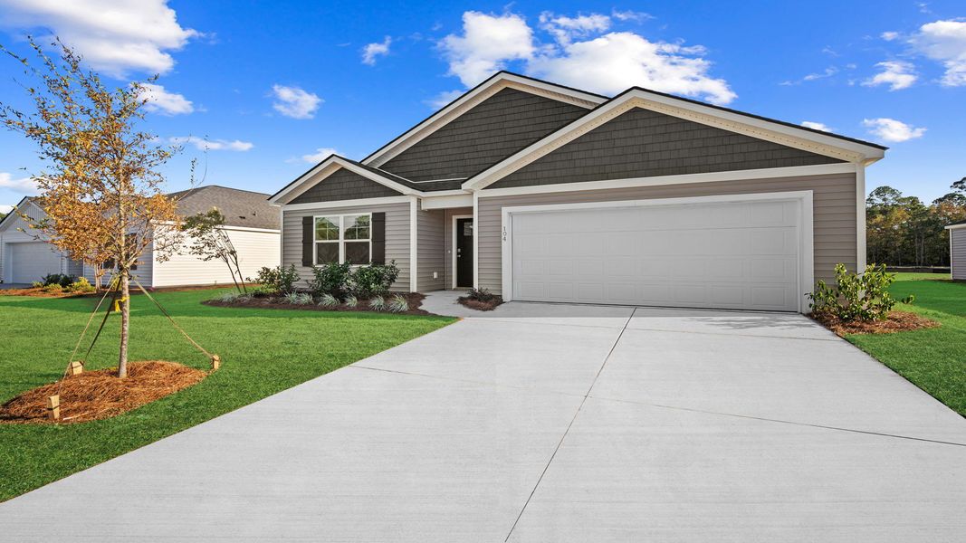 Front exterior of a new home in Palm Ridge, Guyton, GA, highlighting curb appeal (Image 2). Front exterior of a new home in Palm Ridge, Guyton, GA, highlighting curb appeal (Image 2).