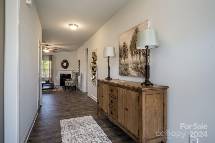 Foyer into Family Room. Photo representation. Colors and options will differ.