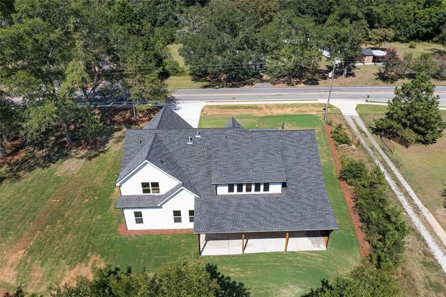 Front exterior of a new home in , Powder Springs, GA, highlighting curb appeal (Image 28). Front exterior of a new home in , Powder Springs, GA, highlighting curb appeal (Image 28).