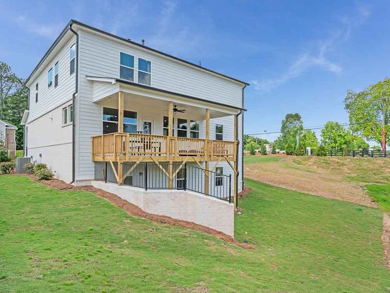 Representative exterior photo of a completed home built from the Essex by Taylor Morrison in Oakmead, Buford, GA (Image 24).